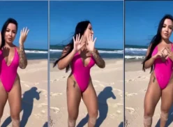 La morena Brena Barbosa bailando emocionada en la playa con un traje de baño bien ajustado resaltando su trasero