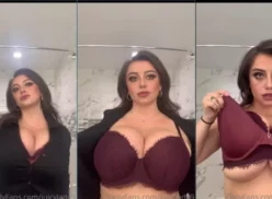 JuicyJade mostrando sus enormes y jugosas tetas mientras se cambia de ropa