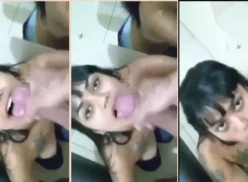 Cleo Matos, una joven, se encuentra sin ropa en el baño mientras realiza una excitante felación