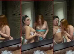 Vídeo para adultos de mujeres besándose y acariciándose en el baño